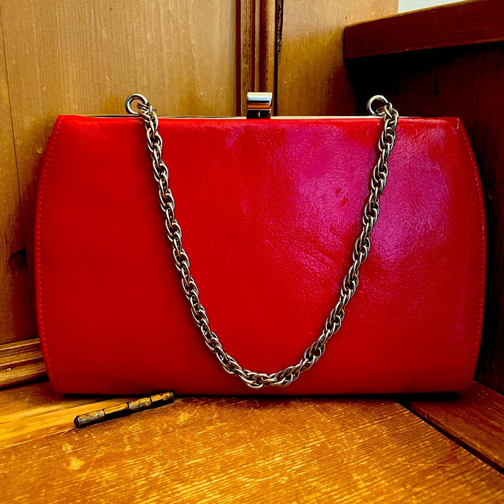 Lipstick red patent leather clutch. Hobo International